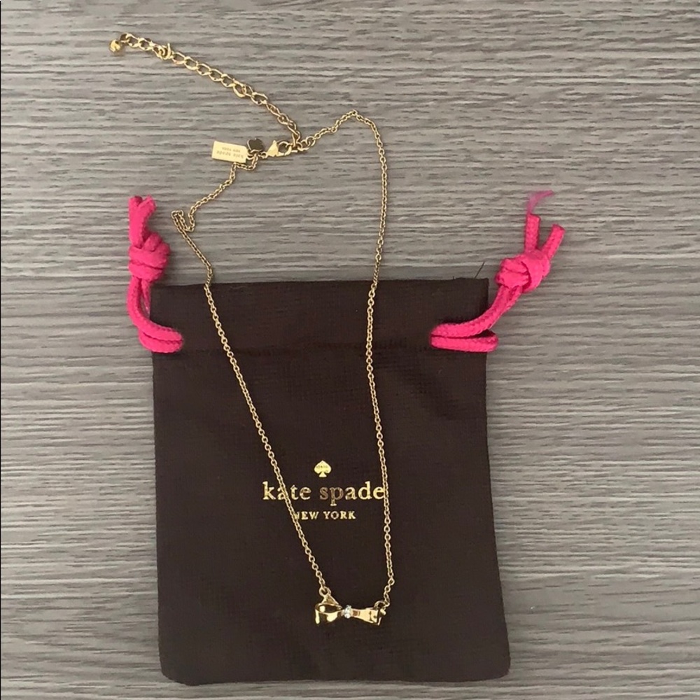 Kate Spade gold bow necklace with 4 crystals